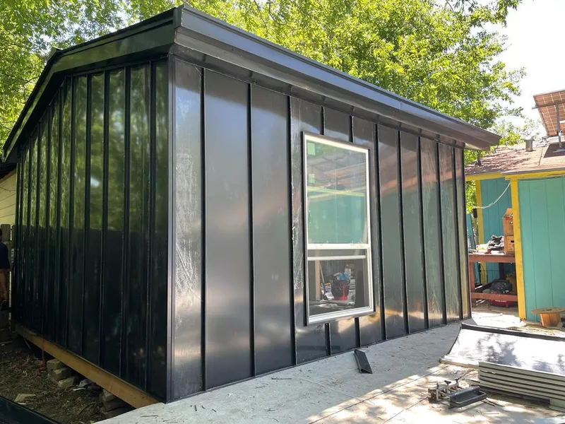 Black standing seam metal wall panels for Metal Roof Installation in Tarrant