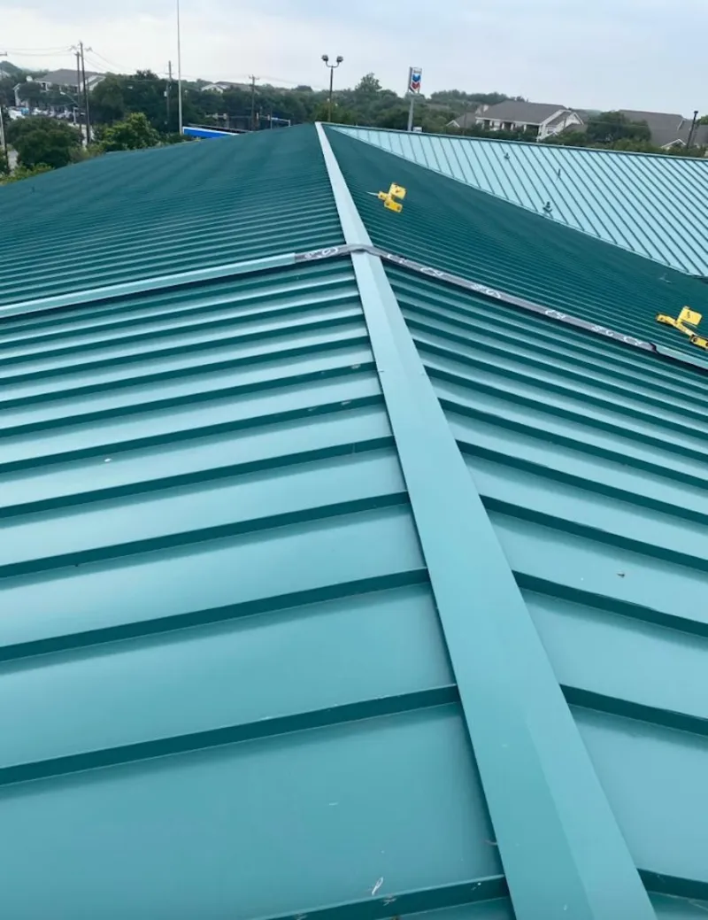 Green commercial metal roof ridge and valley for Metal Roof Repair in Tarrant