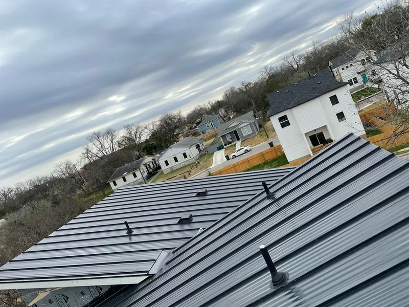 Standing seam metal roof panels with vents for Skylight Repair in Tarrant